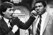 Former WTBS SuperStation TV star Bill Tush takes a sswing at Muhammad Ali